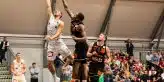 group of people playing basketball