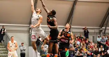 group of people playing basketball